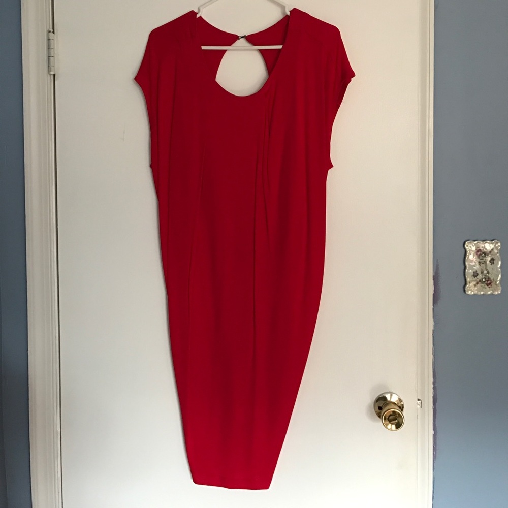 Gorgeous red cocktail dress with open back.