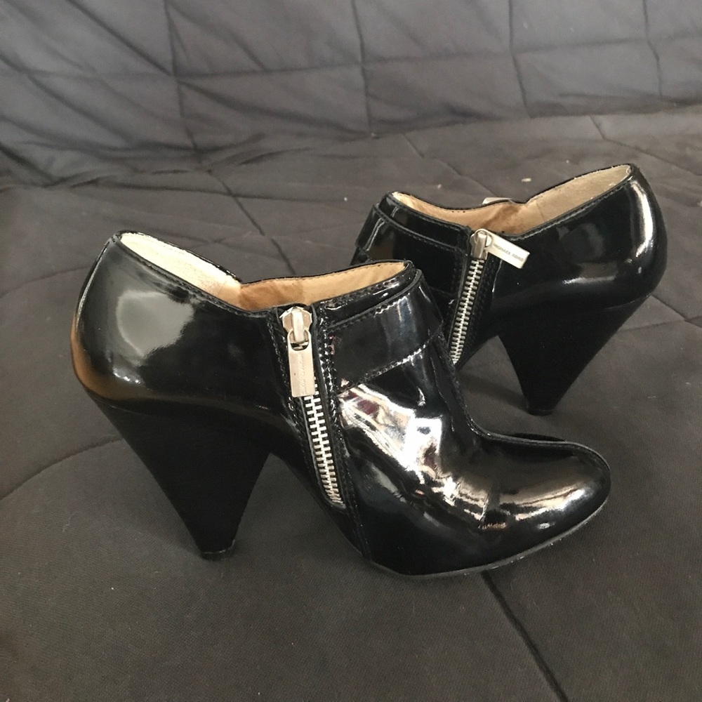 Michael Kors black patent booties.