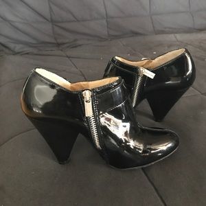 Michael Kors black patent booties.