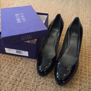 Stuart Weitzman black patent pumps