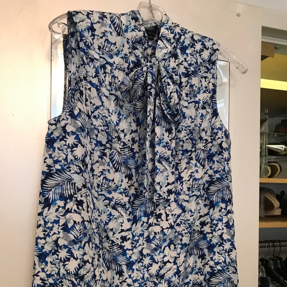 Blue floral silk sleeveless button down