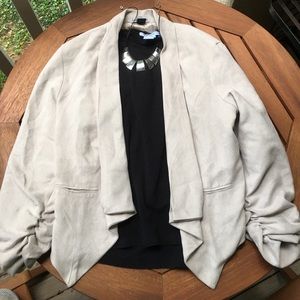 Small Taupe blazer with ruched sleeves.