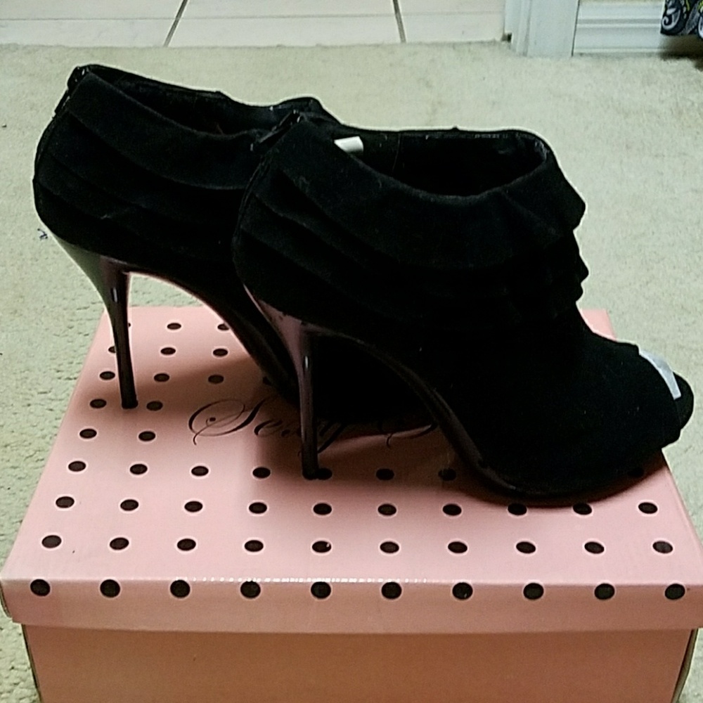 Black suede-like heels