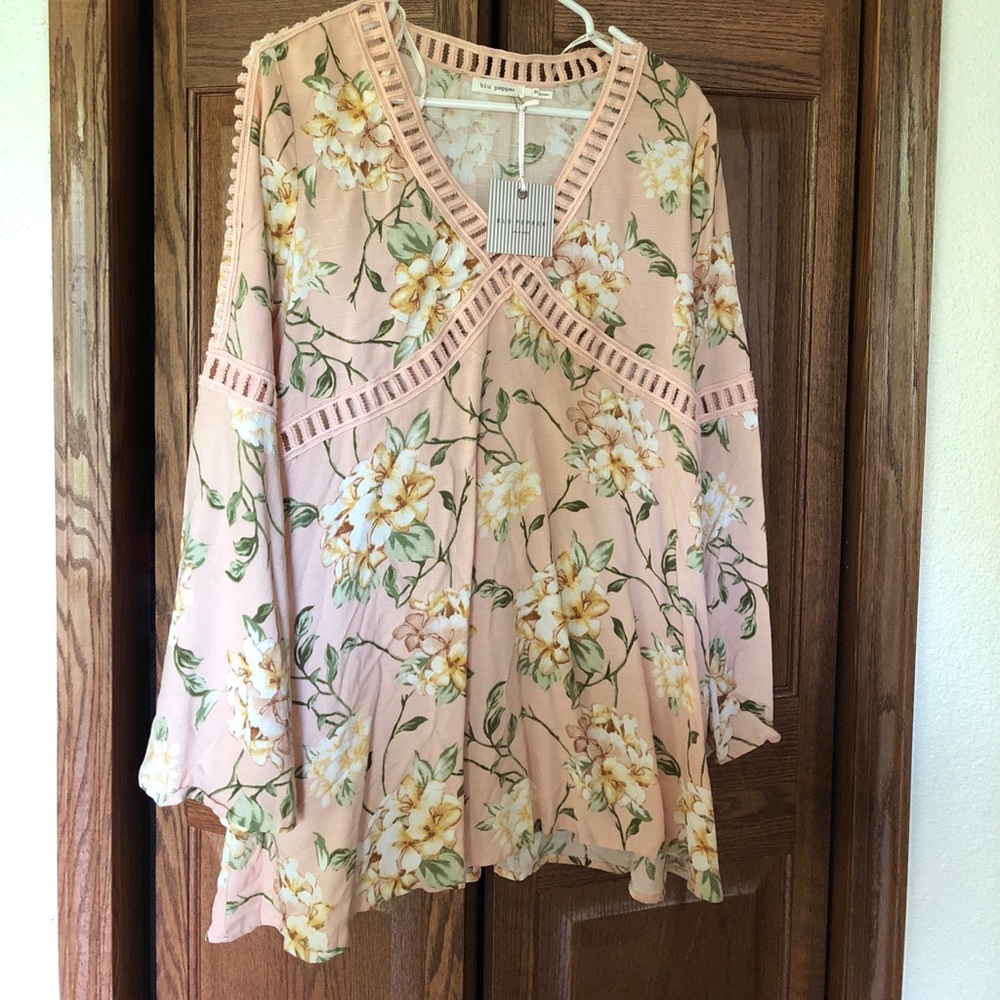 Floral top with bell bottom sleeves