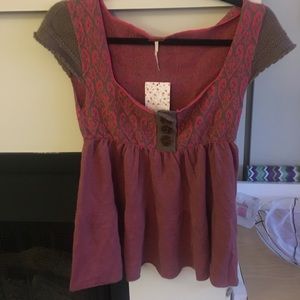 Sweater shirt- tag still on. Never worn.