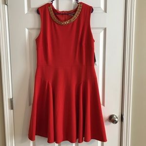 Red/orange fitted dress with gold beaded neck