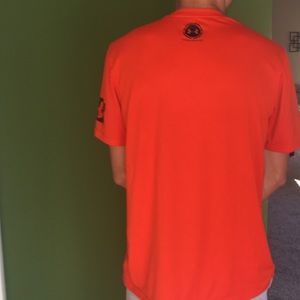 Orange Under Armour athletic t-shirt