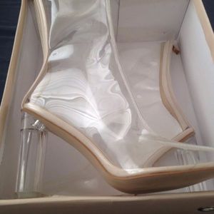Clear high heel boots