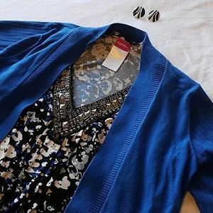 Sharkbite hem tunic with beaded neckline