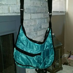 Thirty-one dark green and black purse