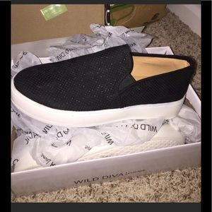 Never worn slip on sneakers