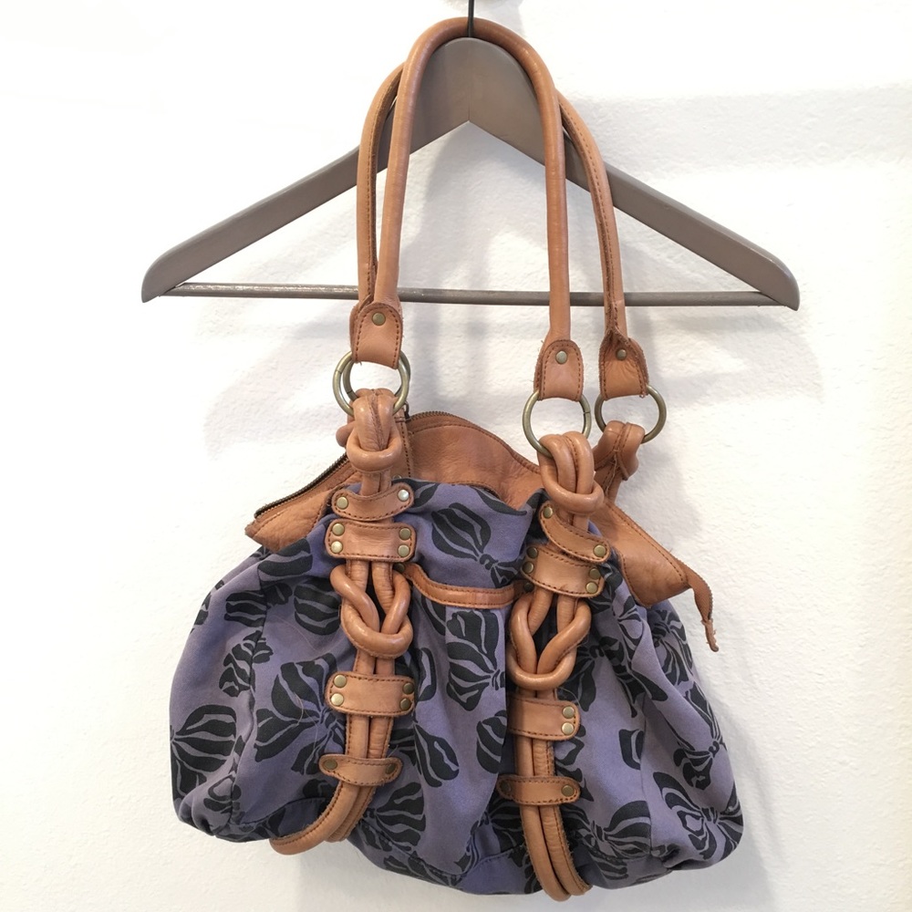 Bag with leather handles