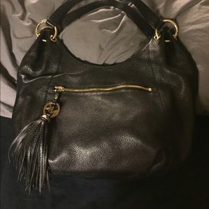 SOLD. Michael Kors charm tassel leather hobo bag