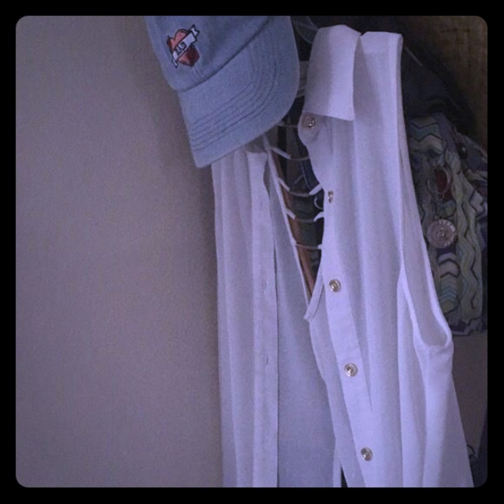 White blouse with gold buttons