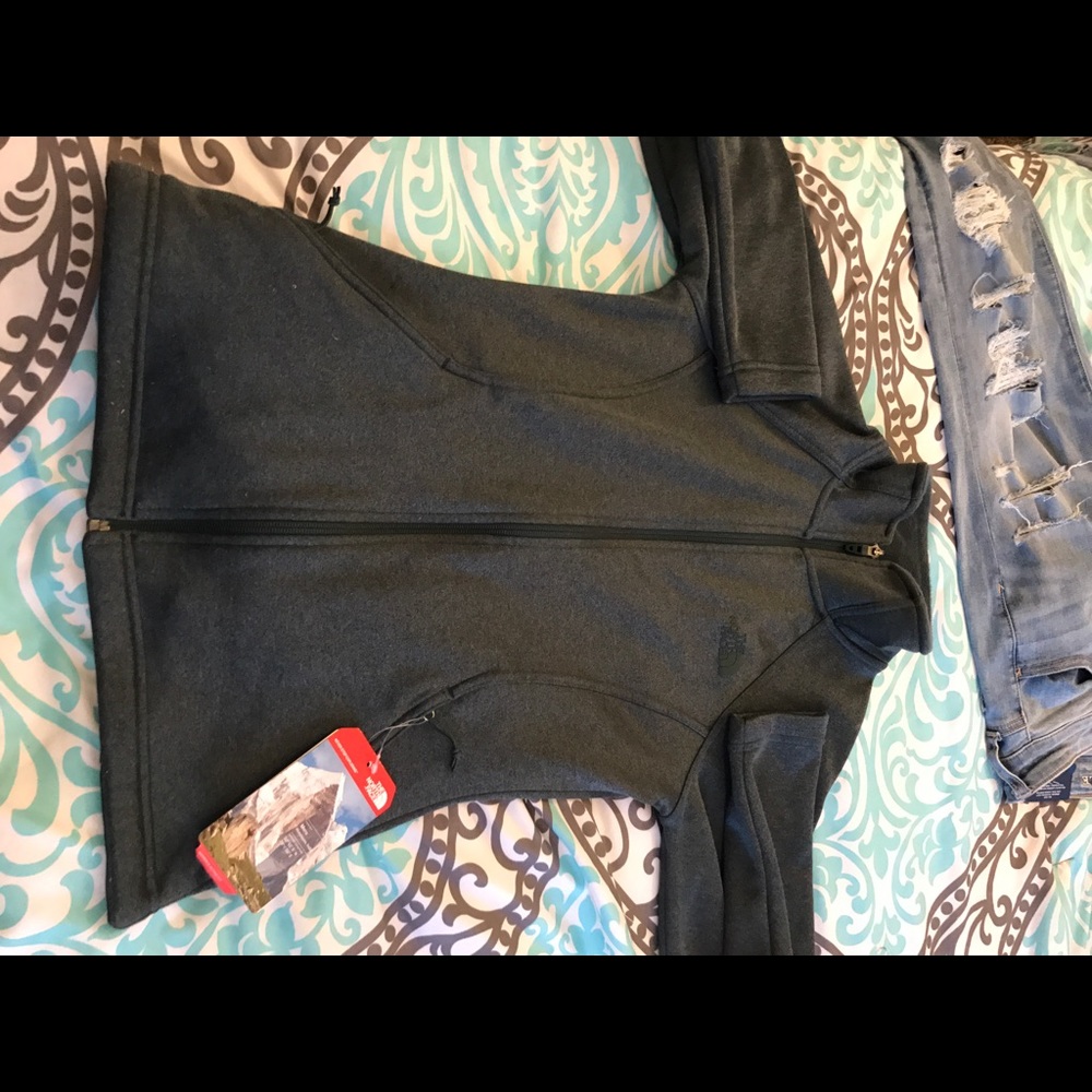Brand new grey north face , never worn