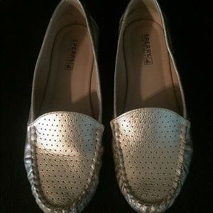 **Make Offer** Gold Sperry leather top siders.
