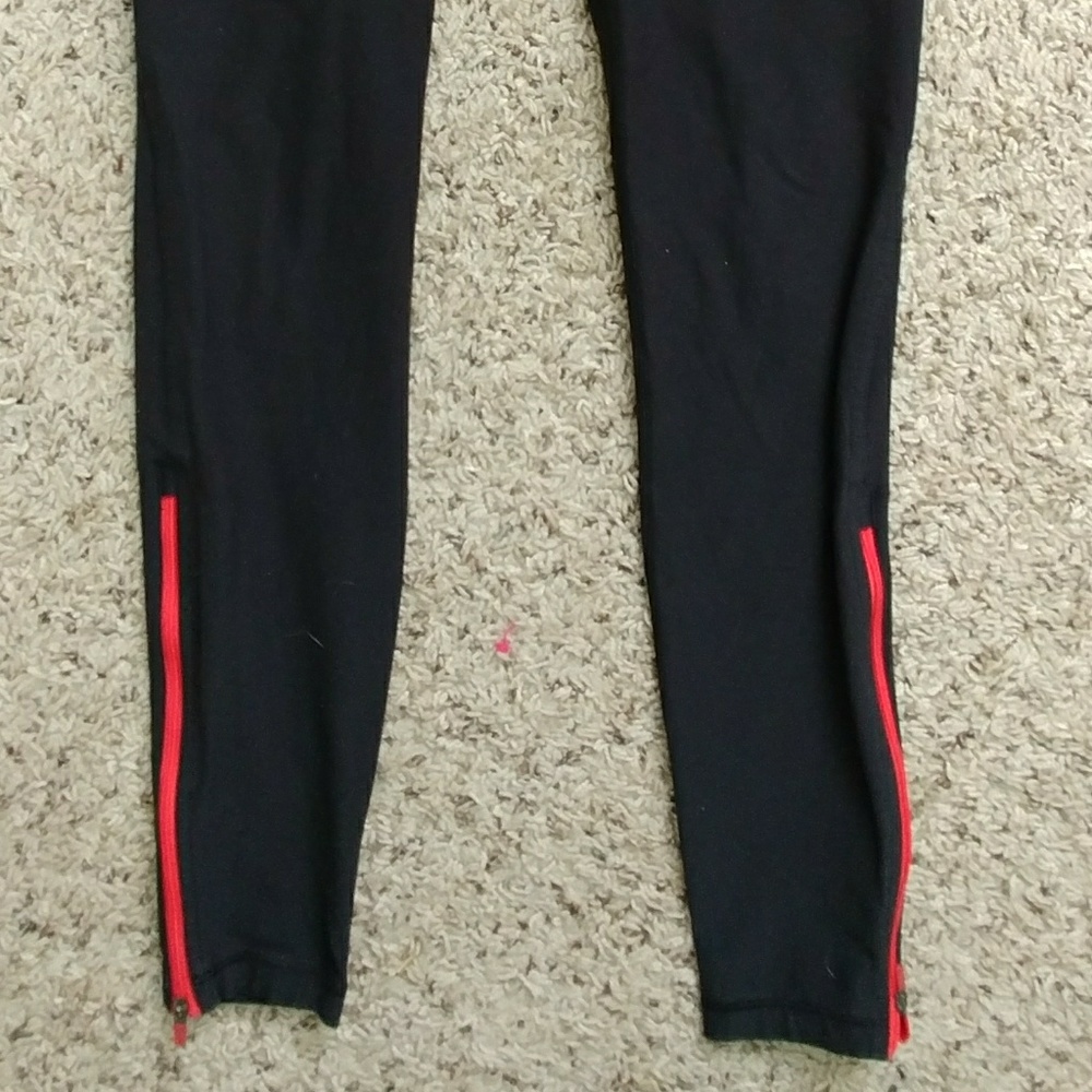Nike black leggings with bright red zipper