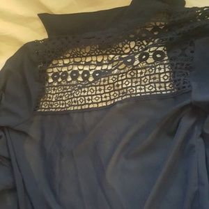 Button up long sleeve blouse ties around at bottom