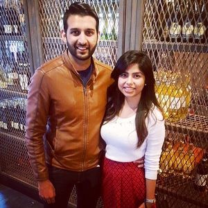 Very cute white sweater with rhinestones on it