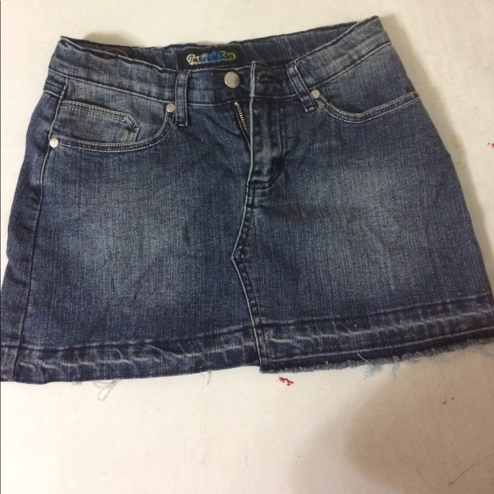 Mini distressed jean skirt