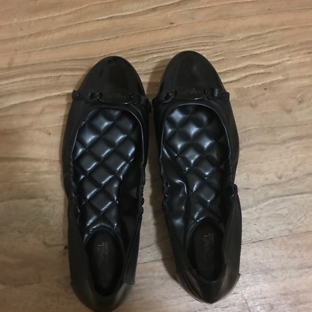 Michael Kors black flat shoes
