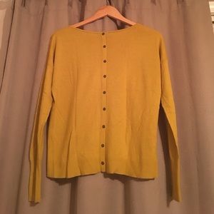 mustard yellow sweater with back button details