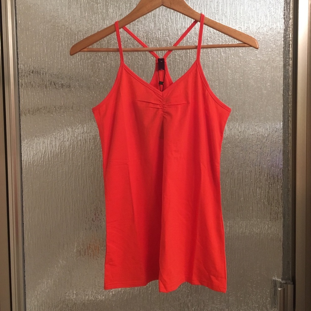 Orange racerback layering tank. Size medium.