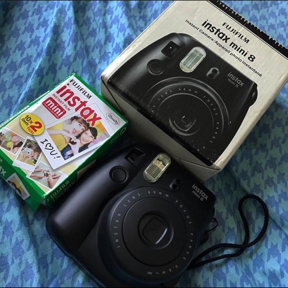 Polaroid camera included film