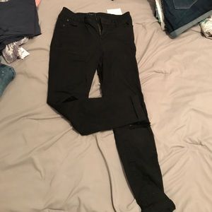 Ripped Knee Skinny Jeans