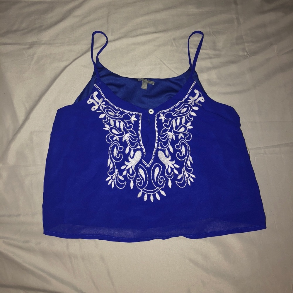 royal blue crop top and floral design.