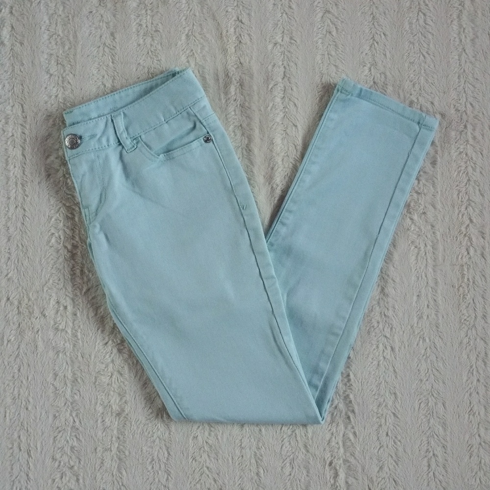 Teal skinny jeans