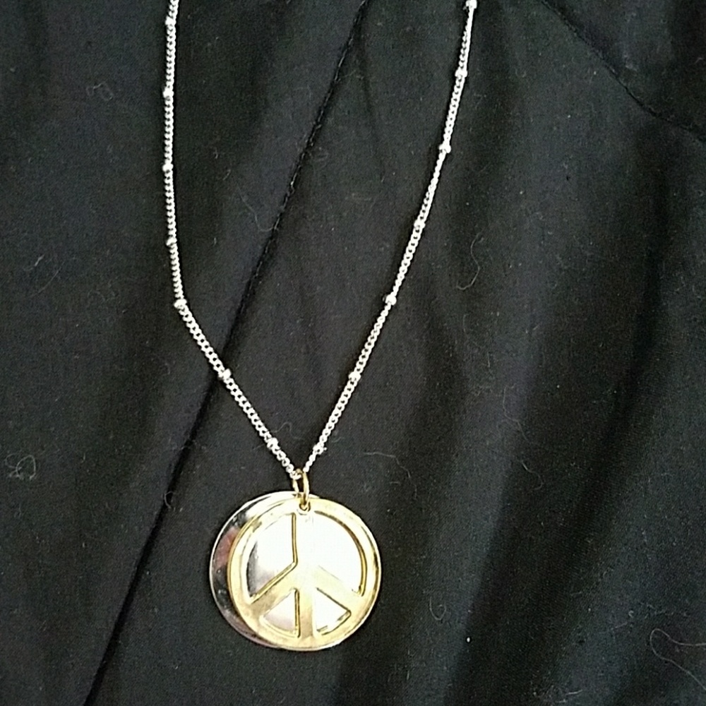 Alexas Angels peace necklace brand new never worn