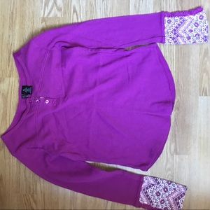 Selling this dark pink shirt with design on sleeve