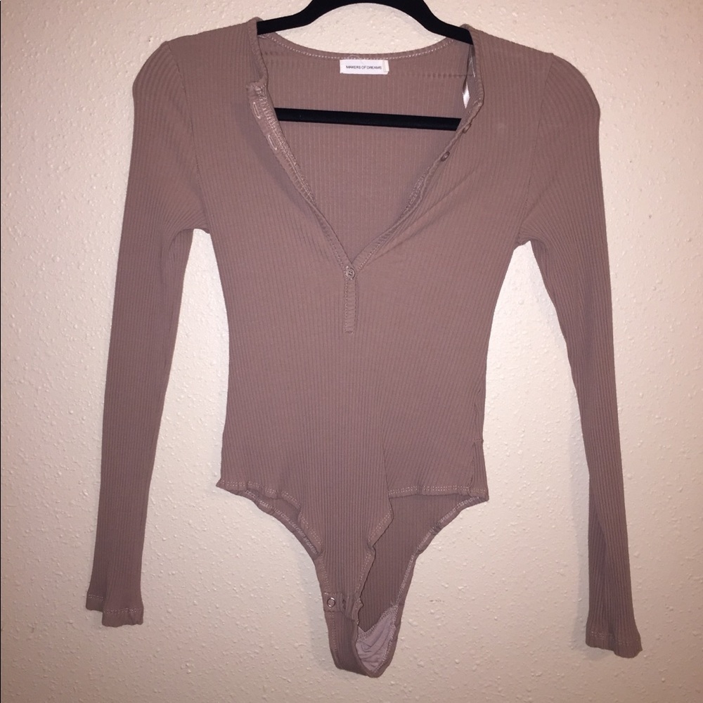 Body suit with snaps.