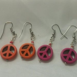 Pink and orange peace sign earrings