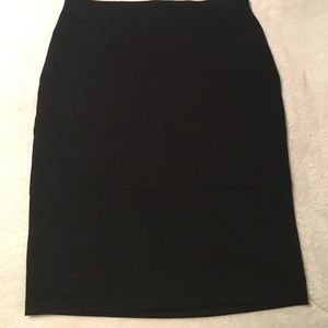 Solid black stretchy pencil skirt, new!