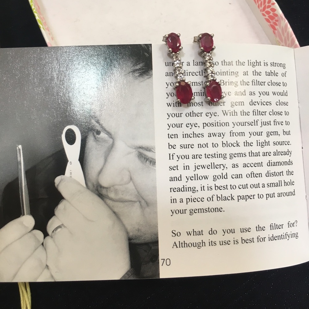 Ruby and white topaz earrings.