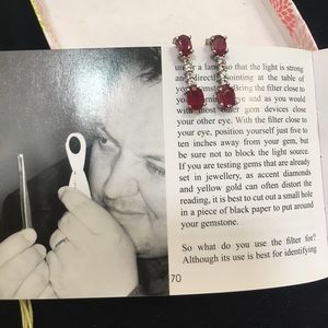 Ruby and white topaz earrings.