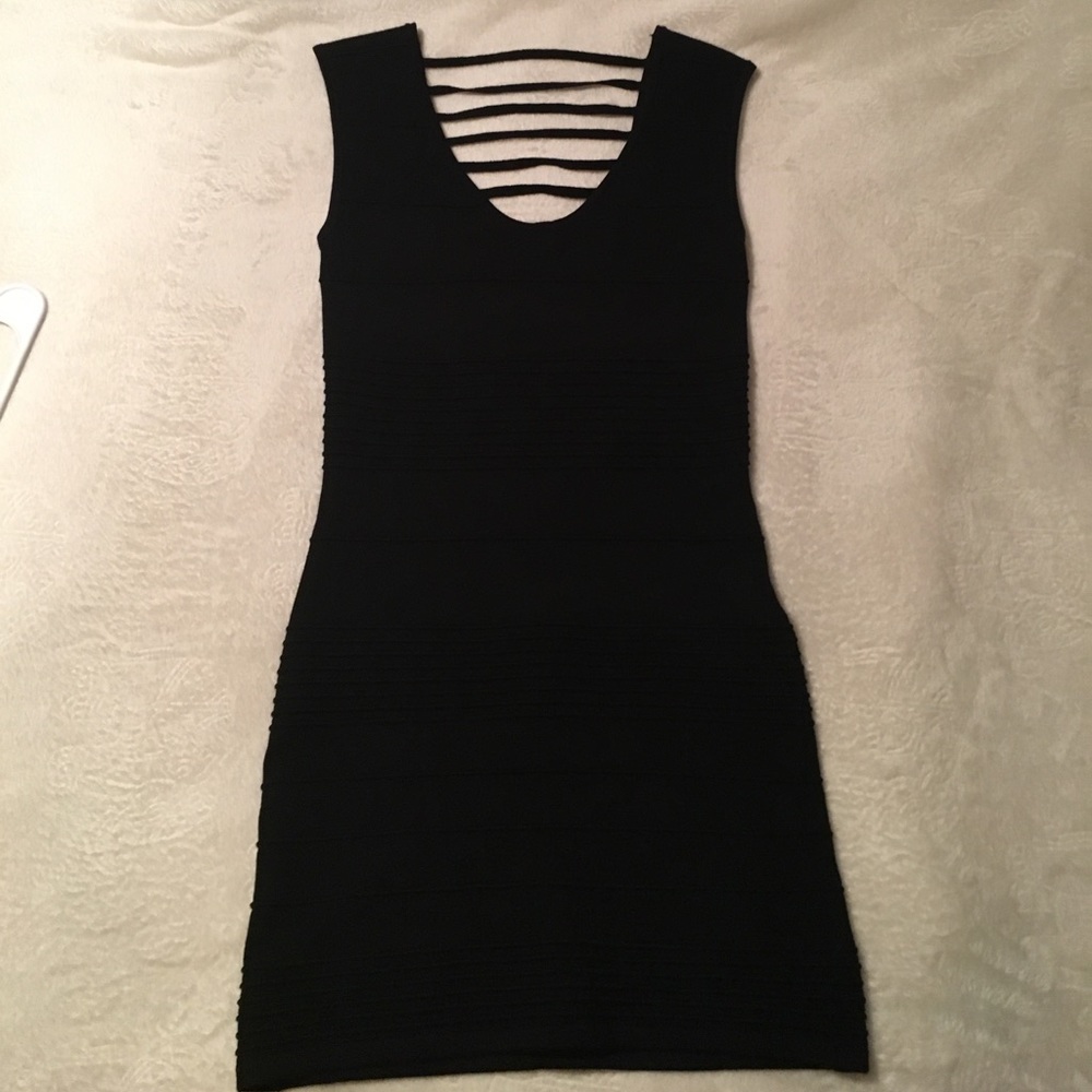 Fitted little black dress, low cut back NWOT