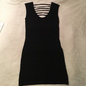Fitted little black dress, low cut back NWOT