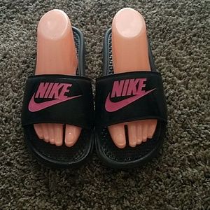 Pink Nike slides