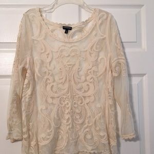 Cream colored lace long sleeve shirt.
