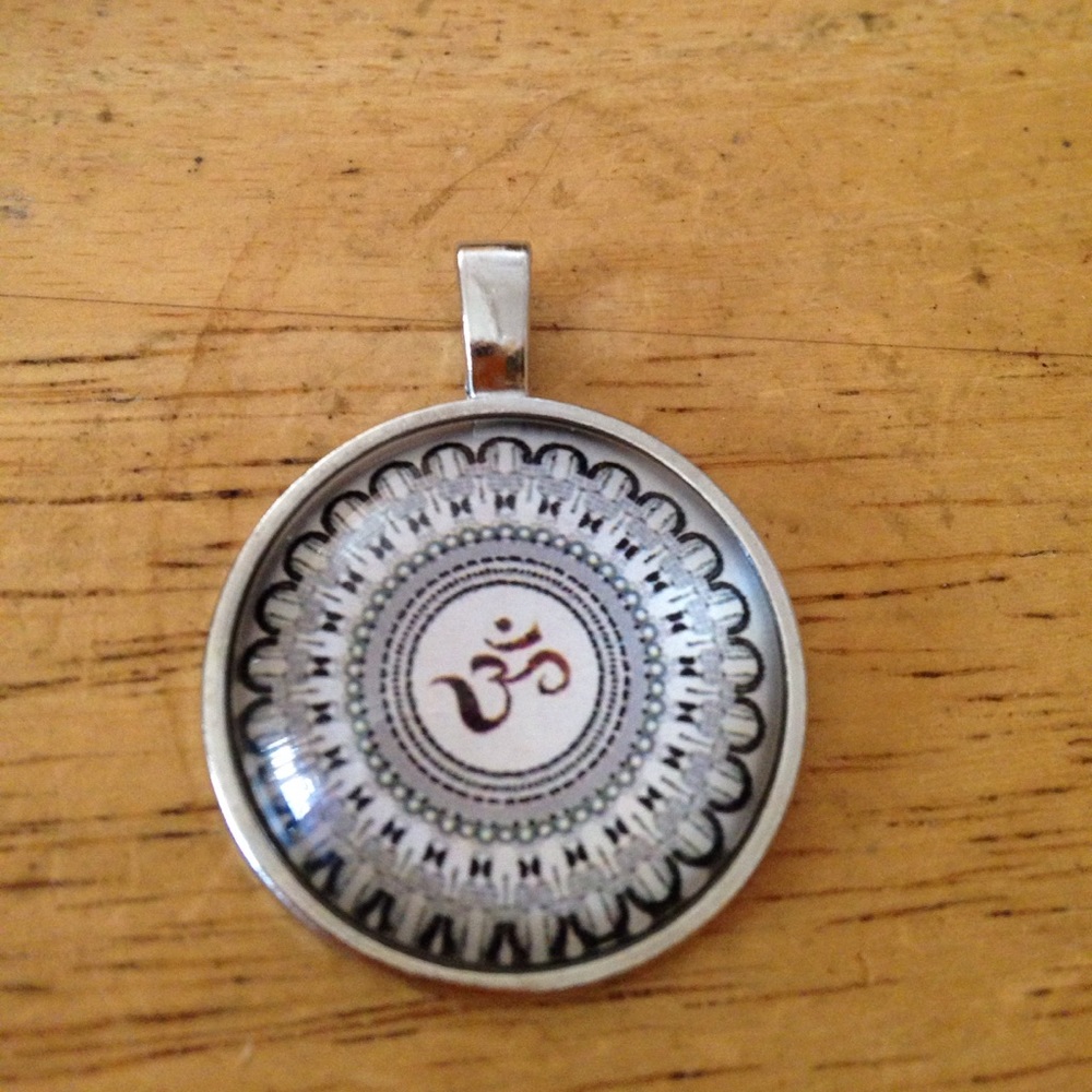 Om symbol cabochon glass pendent