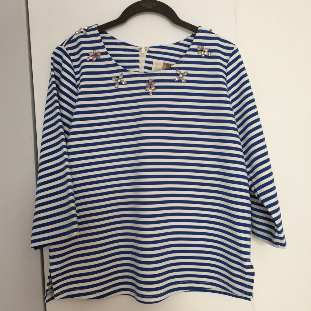 A a blue and white striped, chic top