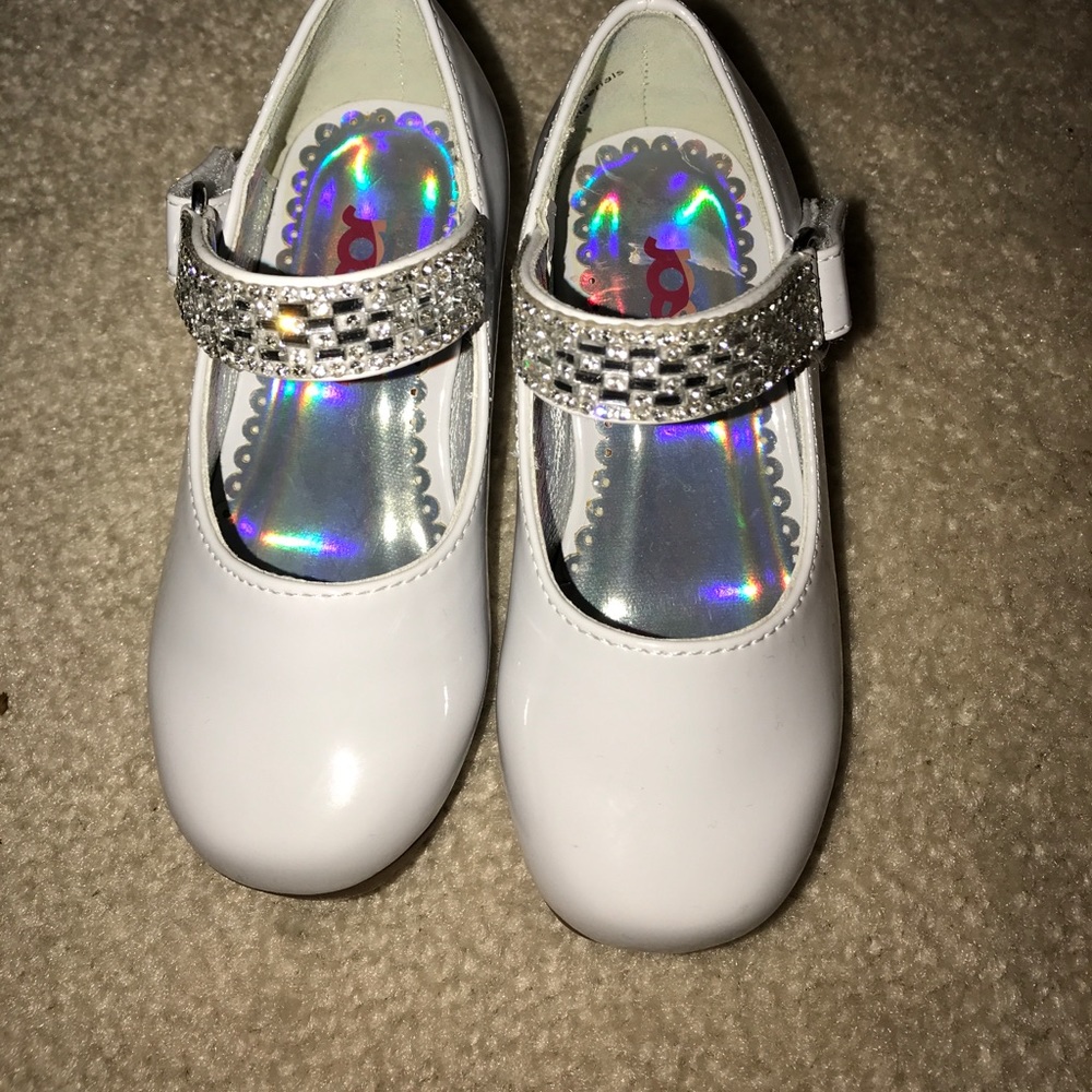 White toddler shoes with little heel