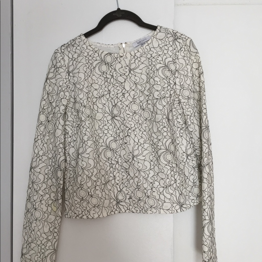 An incredibly chic,black and white,lace crop top.