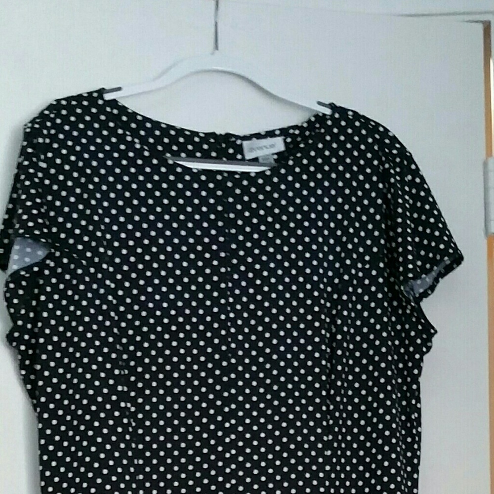 A polka-dot sleeveless dress