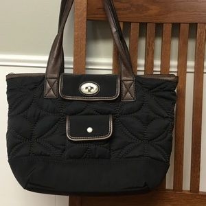 Fossil handbag, black with dark leather trim.