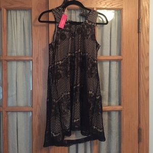 Brand new, never worn black lace dress.