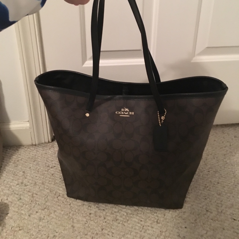 Brown and black Coach tote bag minimally used.